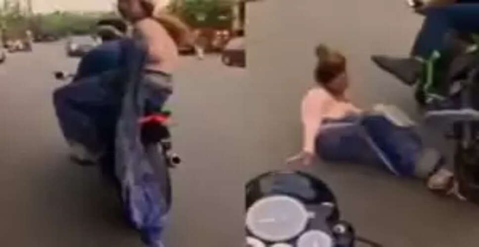 Shocking Viral Video Highlights Dangers of Riding a Bike in Traditional Attire