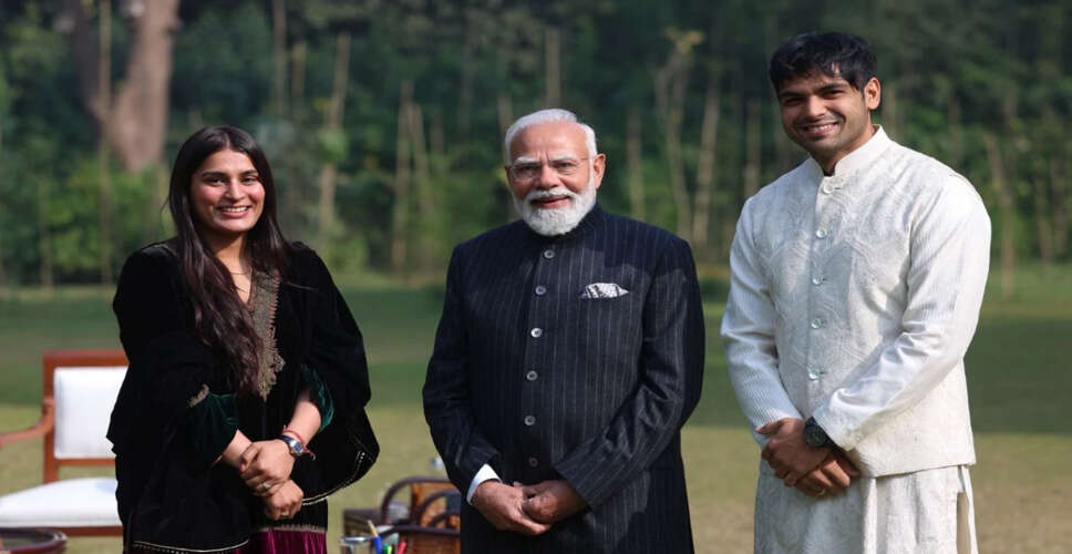 Prime Minister Modi Hosts Olympic Champion Neeraj Chopra and His Wife