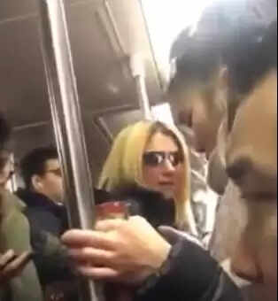 Shocking Subway Incident: Woman's Outrageous Attack on Asian Passenger Caught on Camera