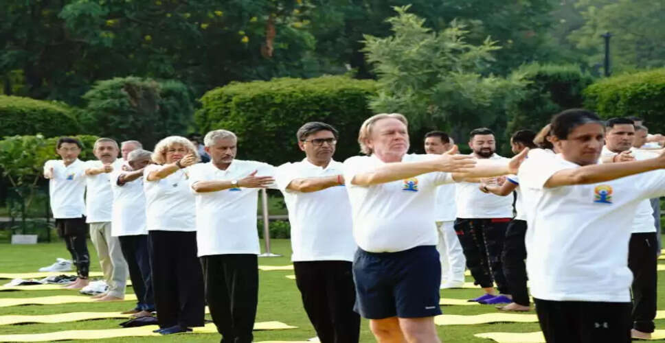 Australian High Commission Celebrates International Yoga Day with Puppy Yoga