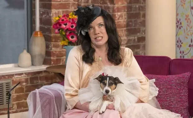 Woman Marries Dog After Divorce, Claims to Be Happier