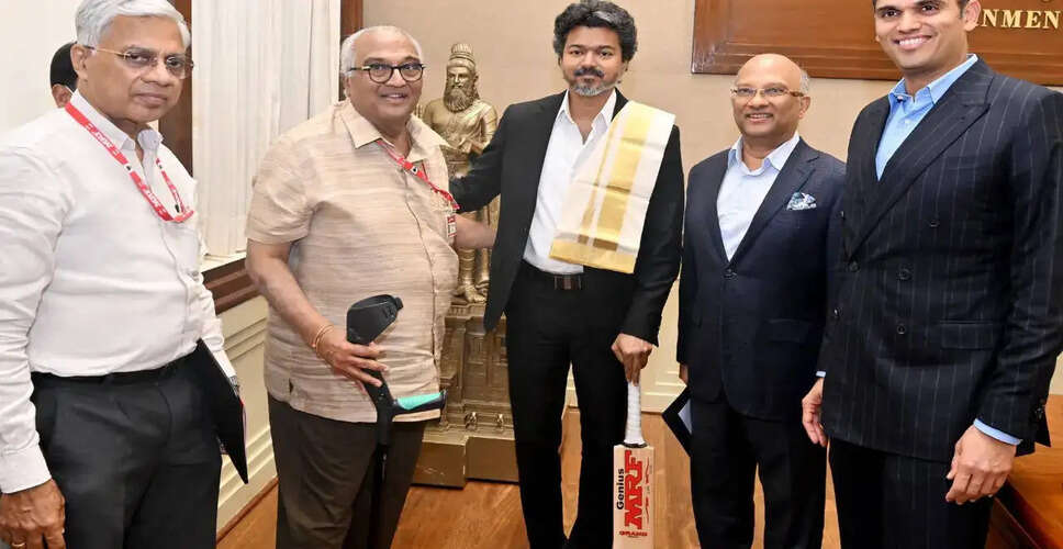 Tamil Nadu CM C. Joseph Vijay Receives Signed Bat from Virat Kohli