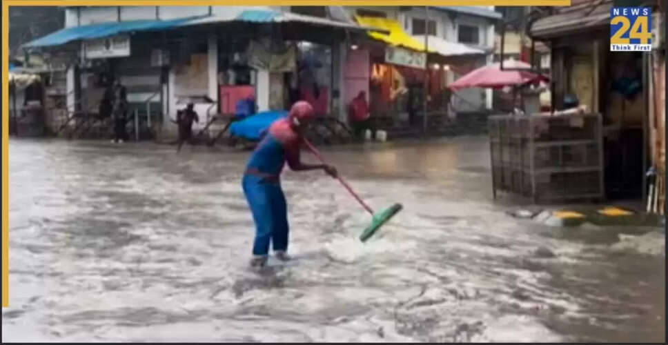 Mumbai's Spider-Man Takes on Flooded Streets with a Mop