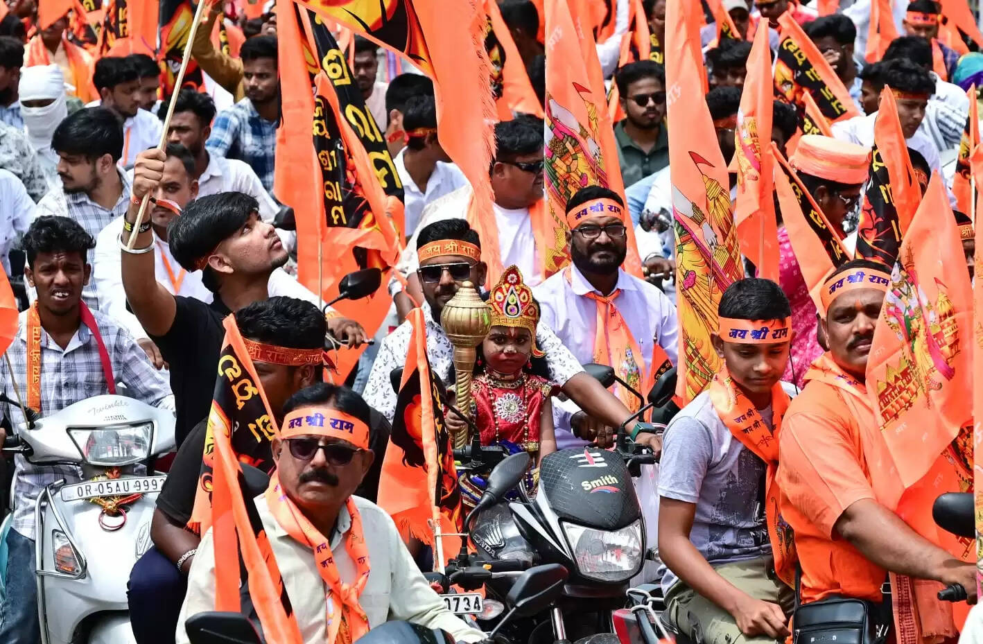 Celebrating Pana Sankranti: Hindu Sena's Vibrant Mahaveer Flag Procession