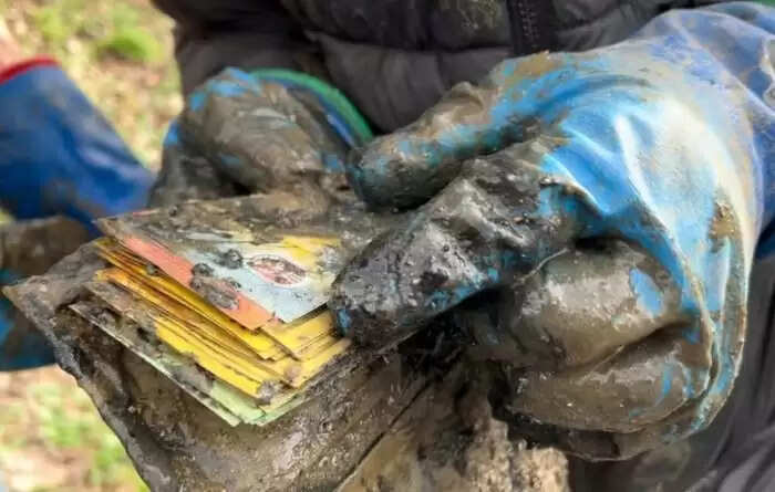 Father and Son Discover Hidden Safe in River, Return It to Owner