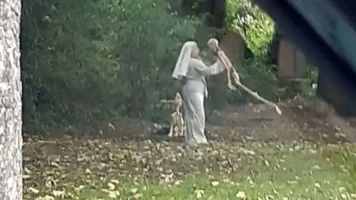 Woman Spotted Dancing with Skeletons in an English Cemetery
