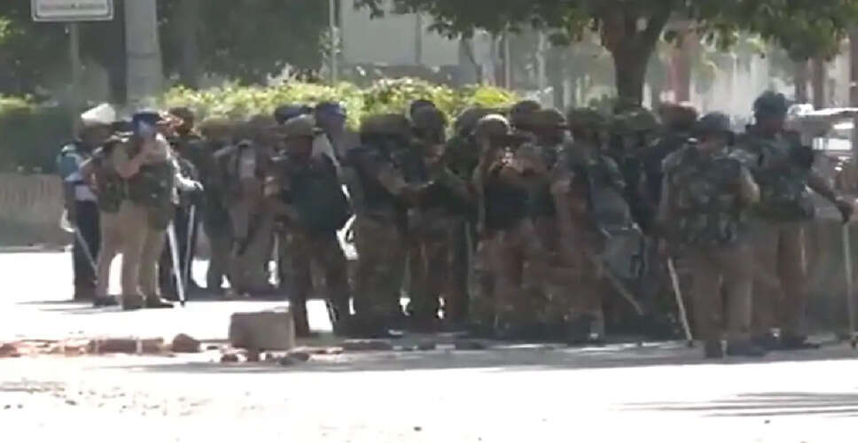 Violence Erupts During Labor Protests in Noida, Police Injured