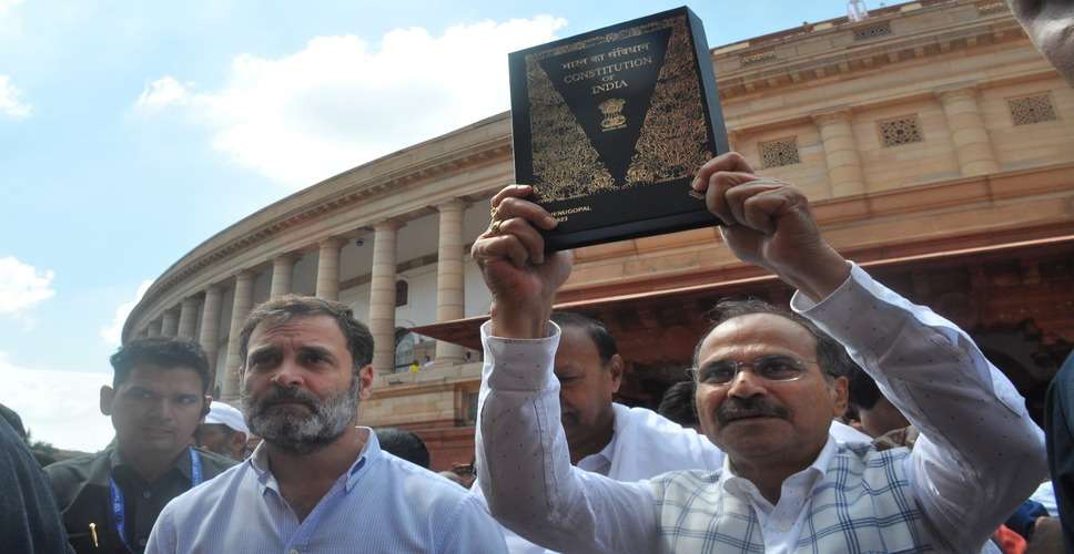 Cong takes copy of Constitution from old Parliament building to new