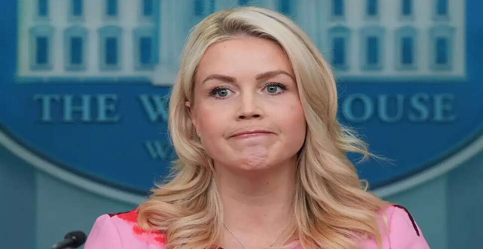 Controversy Erupts Over White House Press Secretary's Photo Removal