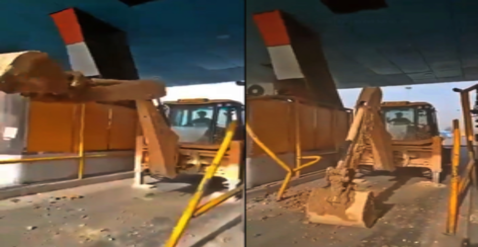 'Angry' JCB driver held after he bulldozes toll booths