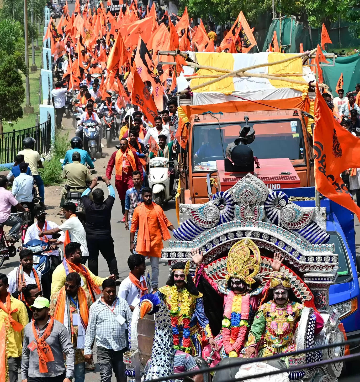 Celebrating Pana Sankranti: Hindu Sena's Vibrant Mahaveer Flag Procession