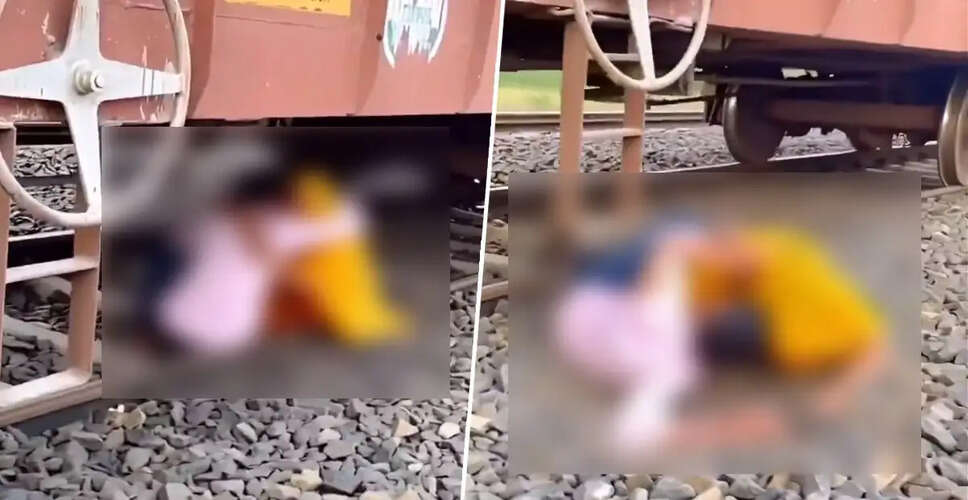 Couple's Dangerous Stunt Under Moving Train Goes Viral