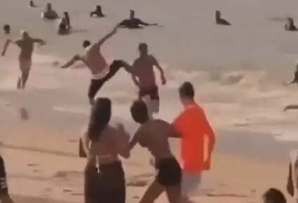 Beach Day Turns into Hilarious Chase: Watch the Viral Video!
