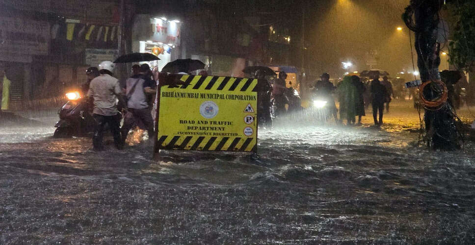Heavy Rainfall Hits Mumbai, Disrupts Traffic