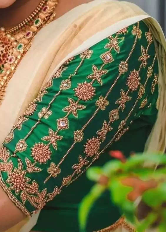 1. Green patchwork designed wedding saw work blouse hand design