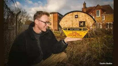 Dumpster Digs: UK Artist Turns Discarded Bin into Charming Tiny Home with Impressive Creativity