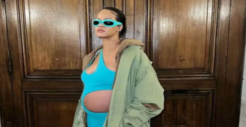 Pregnant Rihanna Baby Bump in Pharrell's Louis Vuitton Menswear