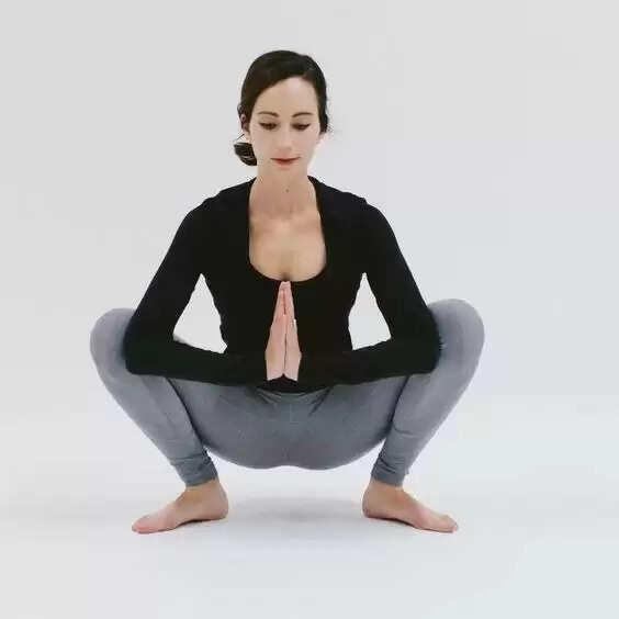 4. Malsana / Mala Pose: